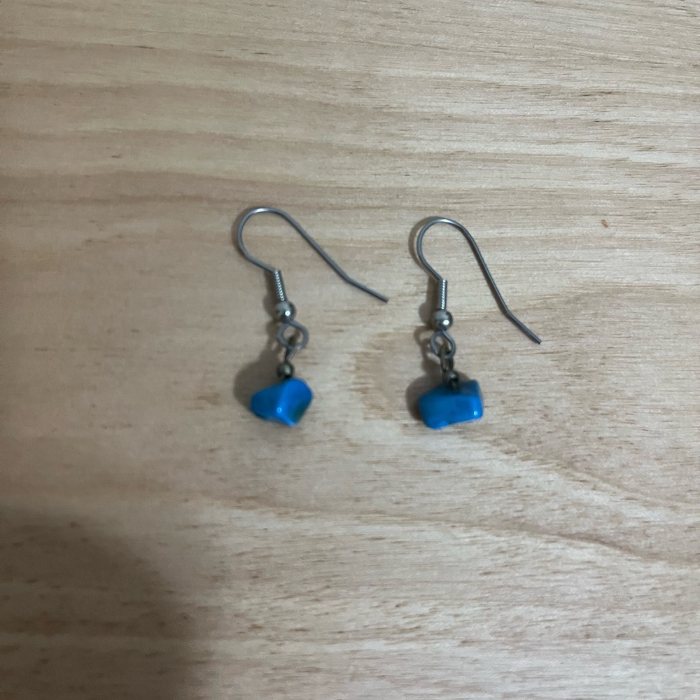 One of a kind earrings purchased at One of a Kind Show.